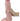 Close-up of a hand holding a beige dildo against a white background