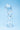 Clarity Seraphic Braid Glass Dildo on a light blue background
