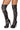 A pair of black spike studded leggings with high heels, designed for adults.