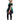 A woman modeling a black and green off-the-shoulder costume dress with a black plaid skirt, black thigh-high stockings, and black high heels against a plain white background.