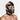 Person wearing a black leather muzzle against a white background