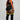 Person wearing black athletic outfit with yellow stripes on a gray background