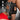 Master Series Thunderstick Thigh Strap Vibrating Wand with Harness with measurements and features on a person wearing red.