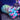 Colorful alien-like creature with pink Creature Cocks Ursa Silicone Pussy Stroker on a dark background