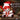 White Teddy bear dressed as a Santa Claus with plaid accents on a wooden surface with Christmas decorations in the background.