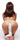 Naked person wearing white fox tail on a white background