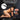 Advertisement for premium pup accessories including a silicone puppy tail and bone gag on a dark background.